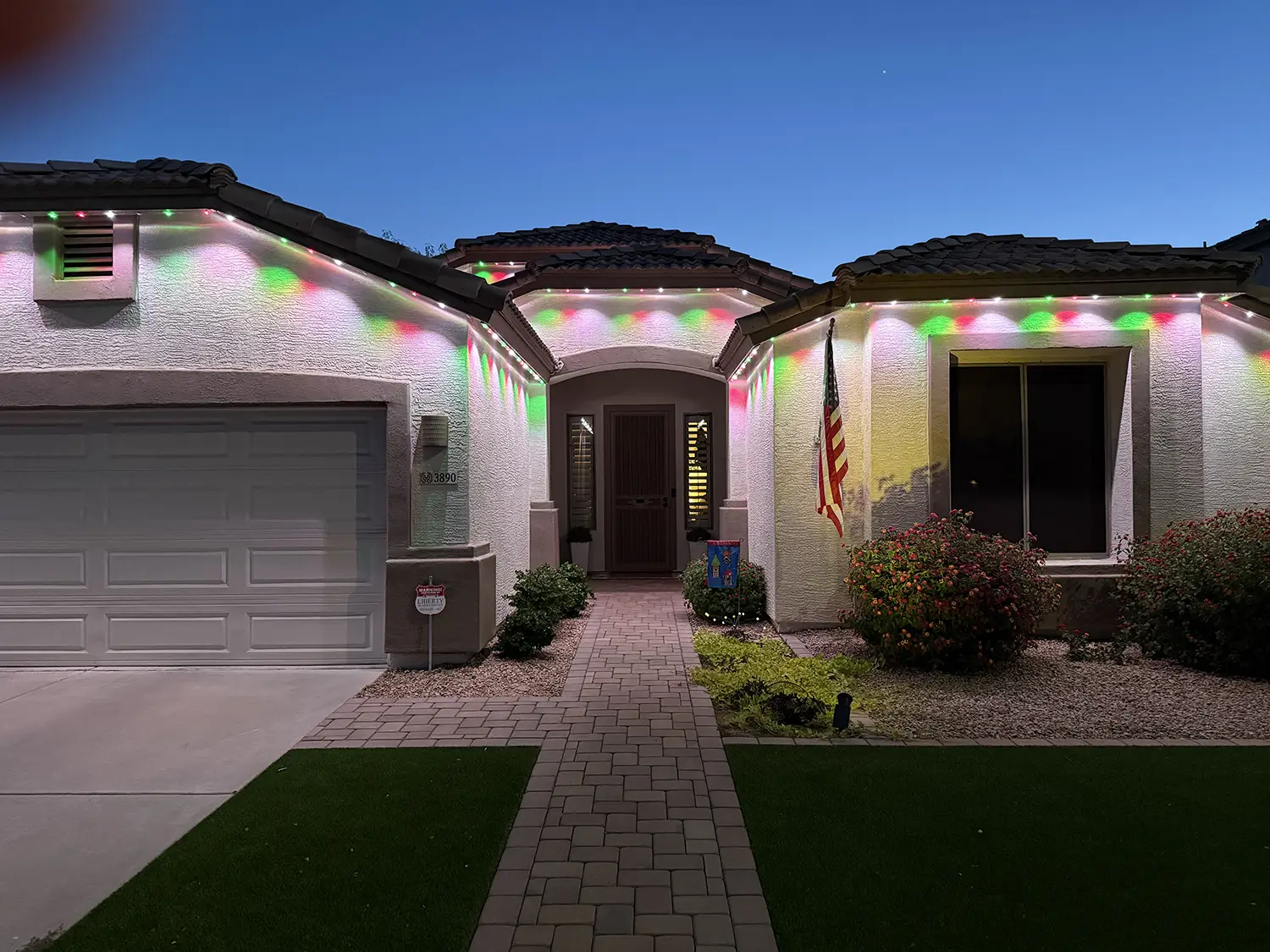 Permanent trim lighting installed on a Cave Creek, Arizona home at dusk