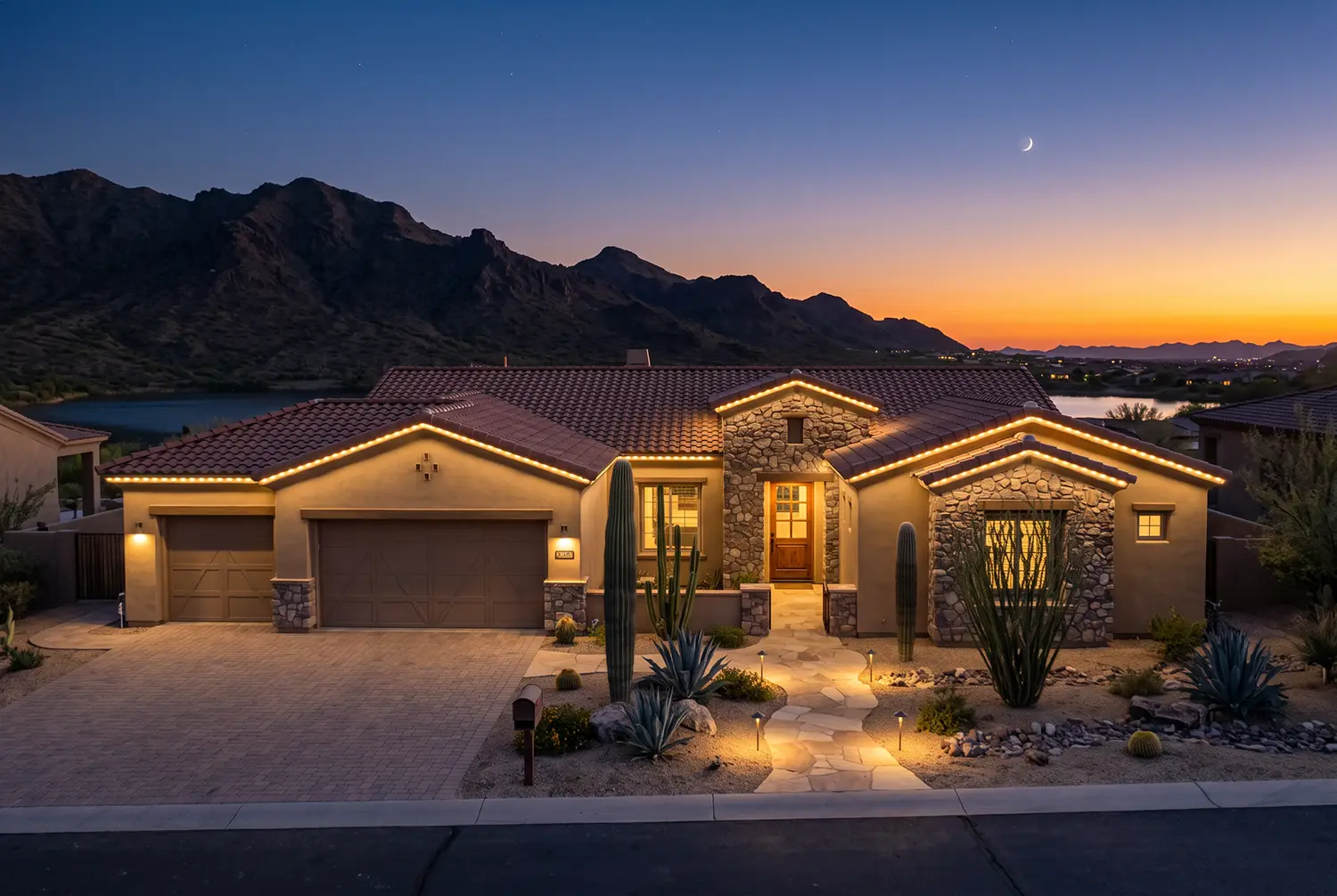 Permanent trim lighting installed on a Goodyear, Arizona home at dusk